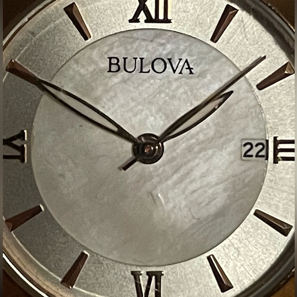 Bulova ladies watch two tone w/ Pearl face Roman numerals